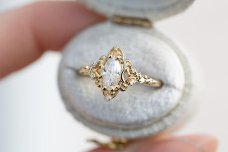 Aurora moon setting with marquise moissanite