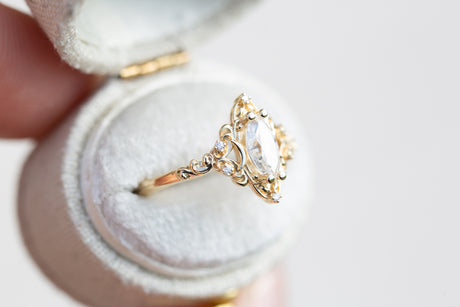 Aurora moon setting with marquise moissanite