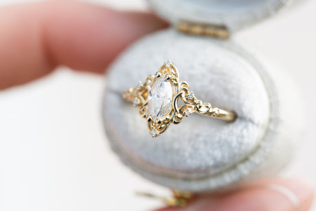 Aurora moon setting with marquise moissanite
