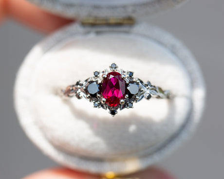 Briar rose three stone with ruby and black diamonds