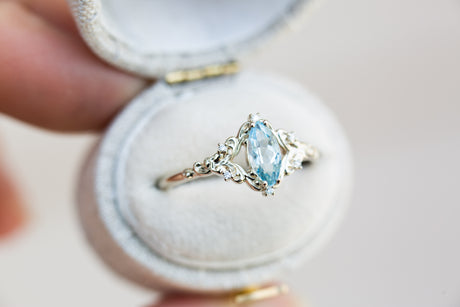 Aurora setting with marquise aquamarine
