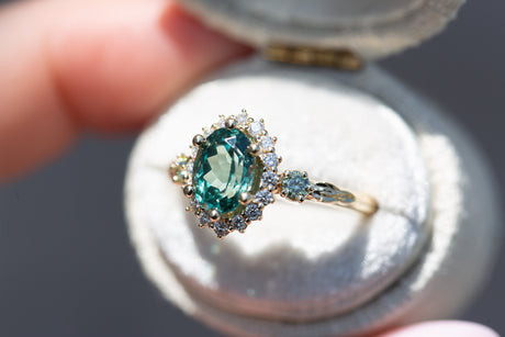 Ash setting with 8x6mm green lab sapphire
