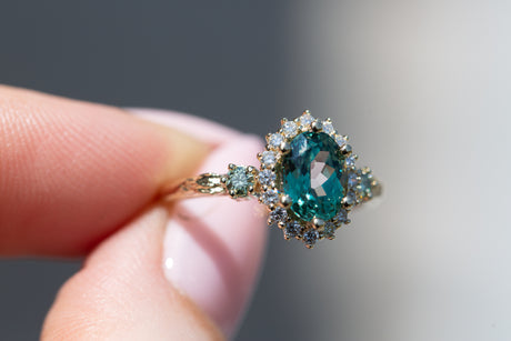 Ash setting with 8x6mm green lab sapphire