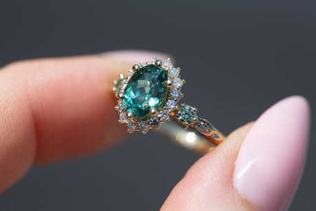 Ash setting with 8x6mm green lab sapphire
