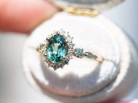 Ash setting with 8x6mm green lab sapphire