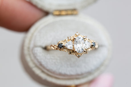 Briar rose five stone with moissanite and black diamonds
