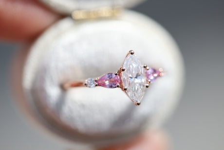 Five stone lattice setting with marquise moissanite and pink sapphire