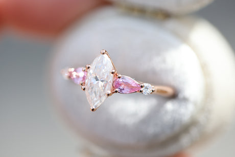Five stone lattice setting with marquise moissanite and pink sapphire