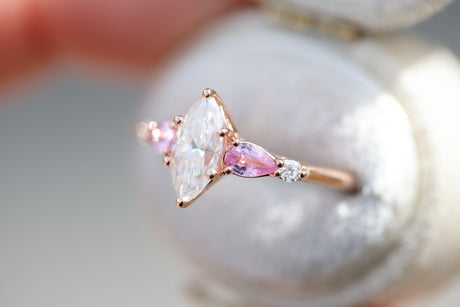 Five stone lattice setting with marquise moissanite and pink sapphire