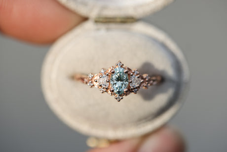 Briar rose three stone with 6x4mm oval teal moissanite
