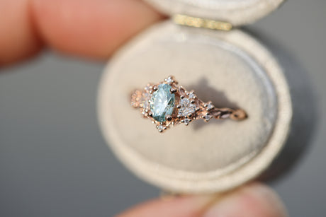 Briar rose three stone with 6x4mm oval teal moissanite
