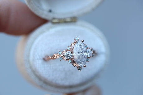 Briar rose three stone with marquise 10x5mm moissanite and aqua diamonds