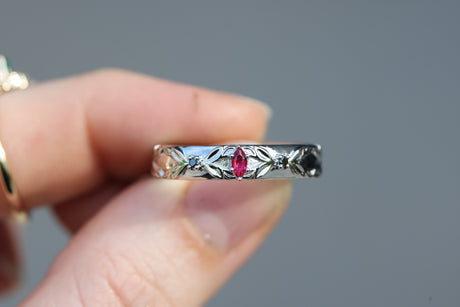 Wide unisex briar band with marquise lab ruby and black diamonds