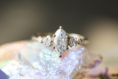 Five stone ring with marquise moissanite