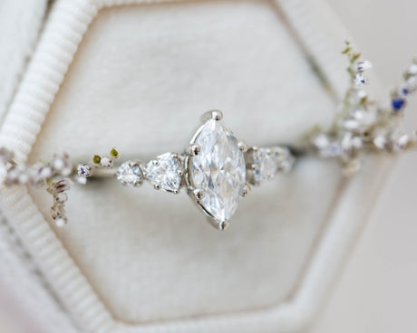Five stone ring with marquise moissanite