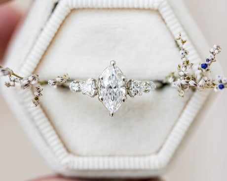 Five stone ring with marquise moissanite